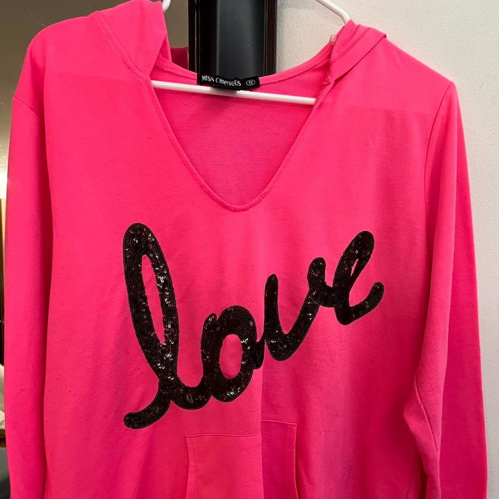 Miss Chievous (1X)65%, polyester 35%, Cotton and is  Made in China
